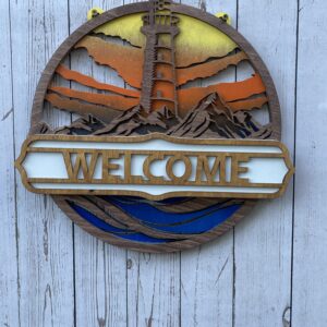 Welcome sign with a lighthouse