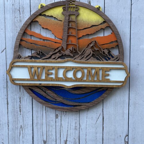 Welcome sign with a lighthouse