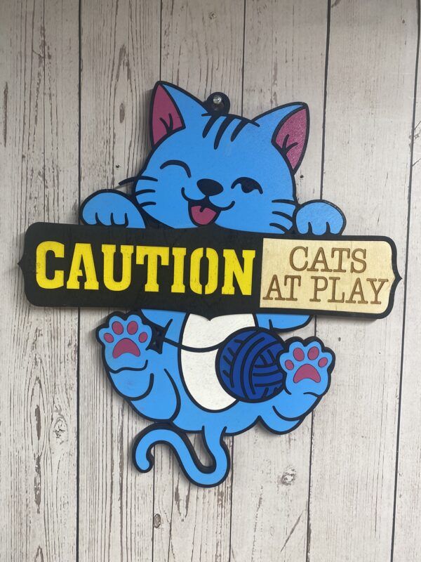 Caution Cats at Play